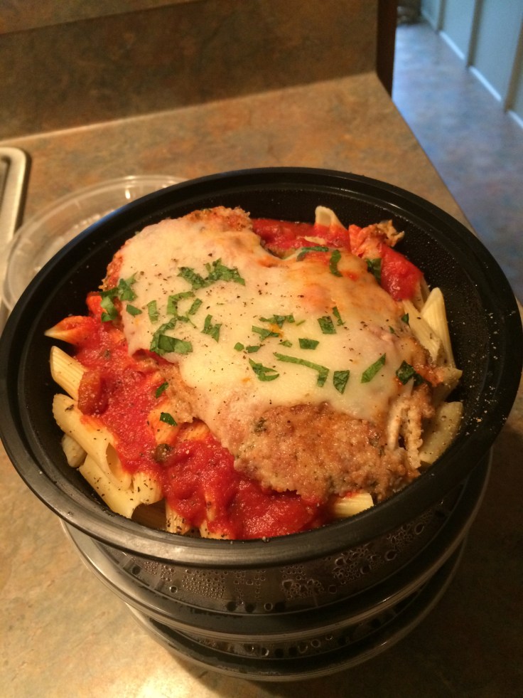 chicken parmesan over penne with red sauce